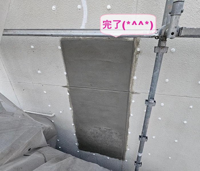神戸市垂水区で傷んだモルタル壁の部分修繕が完了した現場の様子